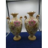 Pair of 2 handled urns, blush gilded and handpainted flower panels, 12.5" high, impressed mark