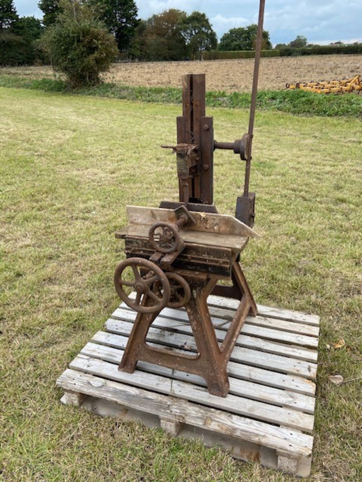 A vintage J. Sissell hand operated morticer with spare blades