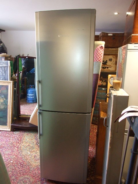 Silver Hotpoint Fridge Freezer 79 inches tall 23 wide 34 deep ( house clearance )