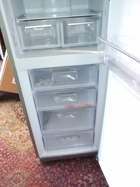 Silver Hotpoint Fridge Freezer 79 inches tall 23 wide 34 deep ( house clearance ) - Image 3 of 4