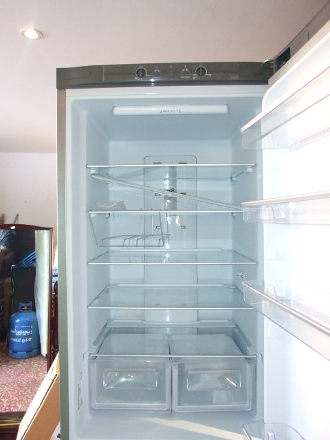 Silver Hotpoint Fridge Freezer 79 inches tall 23 wide 34 deep ( house clearance ) - Image 2 of 4