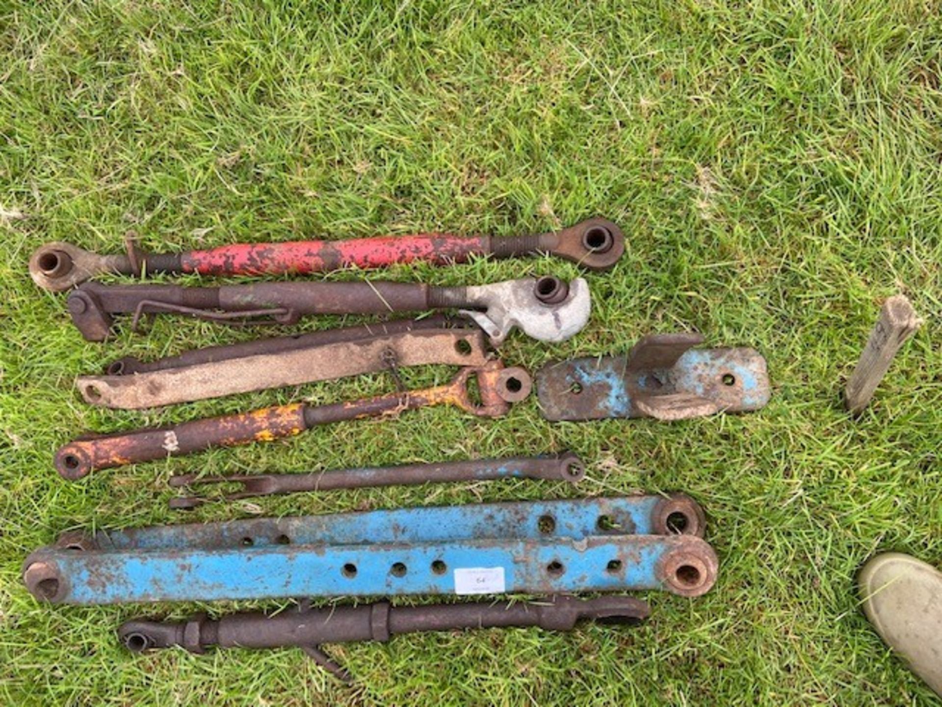 Various tractor lift arms and bars