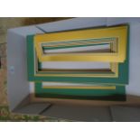 Box of green and gold picture mounts