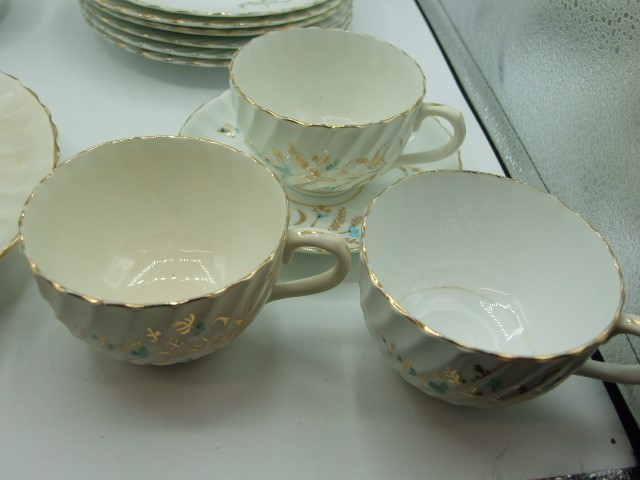 Tea Set comprising of Sandwich Plate , 6 Side Plates , 6 Cups , 5 Saucers - Image 4 of 5