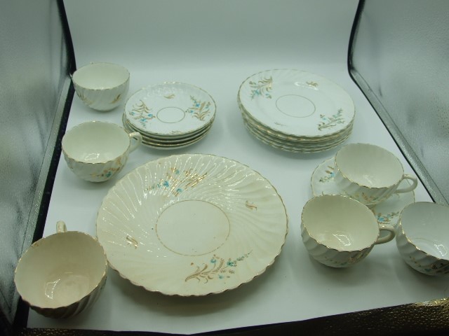 Tea Set comprising of Sandwich Plate , 6 Side Plates , 6 Cups , 5 Saucers