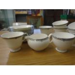 Wedgwood china in the Amherst pattern, 9 cups, milk jug and 10 saucers plus 2 other plates