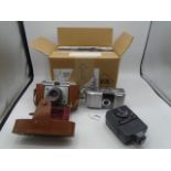 Panasonic cardshot and Dacora cameras, incases plus flashes, charges etc