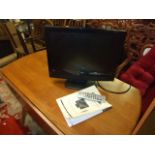 Goodmans 19 inch HDMI TV with remote and book from house clearance