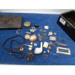 Black Japanesed box with sundry items incl shoe buckle, clay pipe etc