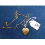 9ct gold heart locket and yellow metal chain, 6.5gm gross