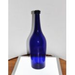 Bristol blue glass bottle approx. 11" tall