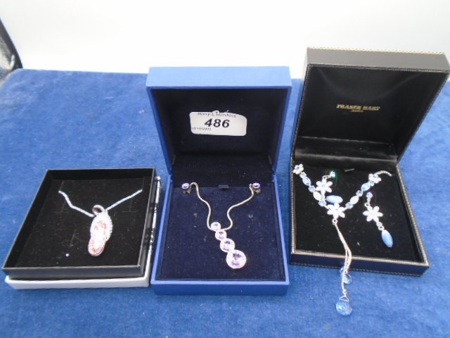 2 jewellery sets with necklace and matching earrings plus one one other necklace
