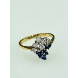 An 18ct (.750) gold sapphire & diamond ring