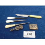 Silver stamp holder/envelope plus picks with mother of pearl handles etc