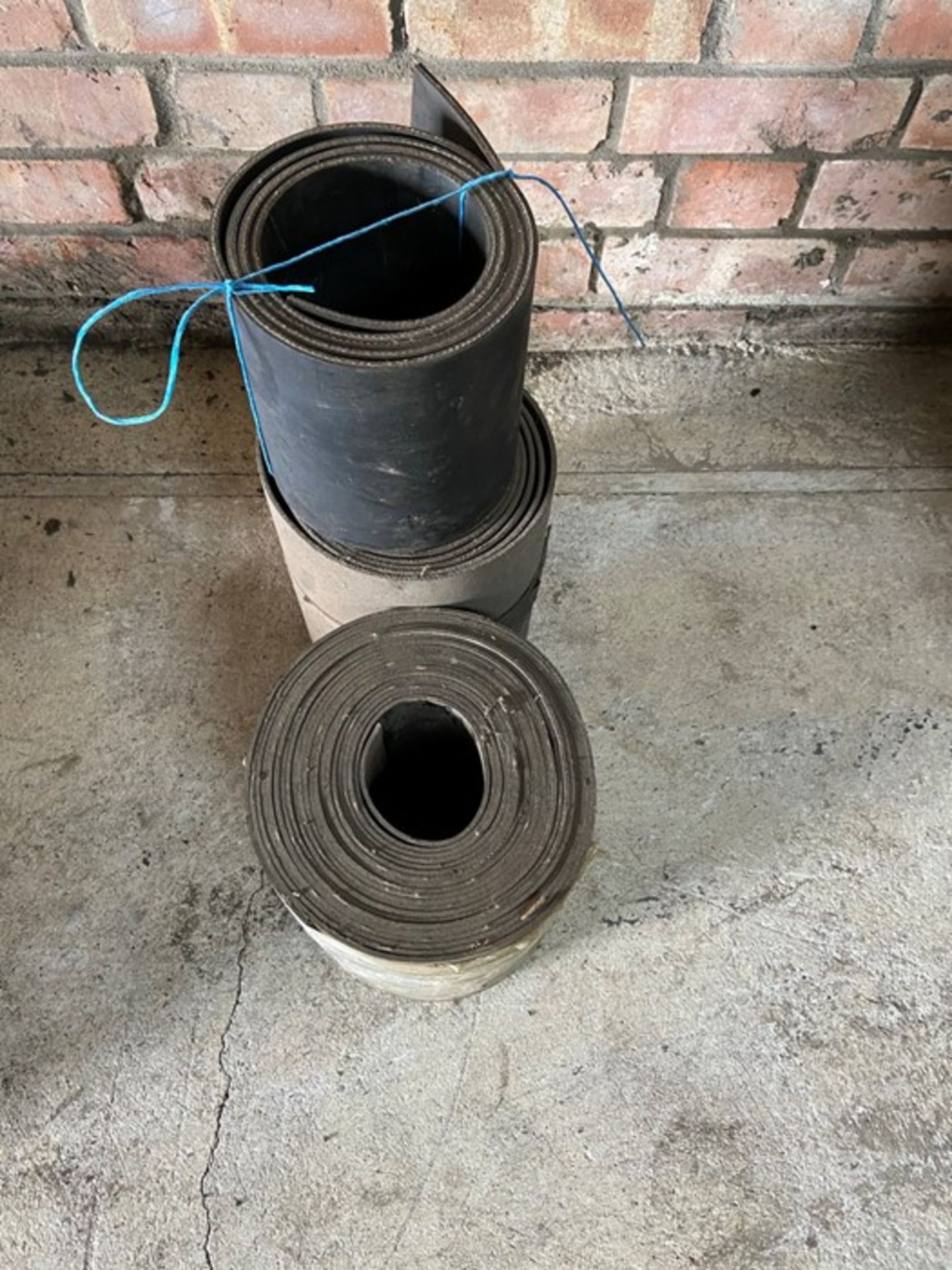 Rolls of rubber belts