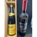 A bottle of Queen Mary 2 Cabernet Sauvignon (California) in presentation box and a bottle of Vins