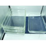 4 Pyrex rectangular dishes largest 15 x 19 inches and mixing bowl with pouring lip.