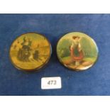 2 antique circular papier mache snuff boxes, one featuring a man with dogs pulling a cart with the