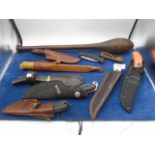 Quantity of sporting knifes in sheafs incl Buck, EKA Sweden, Ka-bar, Perkin etc plus wooden priest