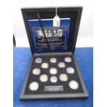 Boxed set of 13 coins House of Windsor coinage portraits shilling set with certificate of