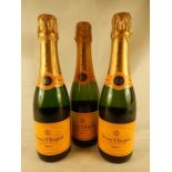 Three half bottles of Veuve Clicquot Champagne