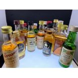 A collection of scotch whisky miniatures to include: Littlemill 8yr old malt; Long John; Glenborough