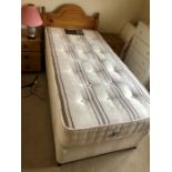 Cumfilux Comfimax Nirvana Single Divan with mattress. Base has 2 sliding doors. Damage to corners on