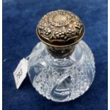 Glass Perfume Bottle with Silver Top.