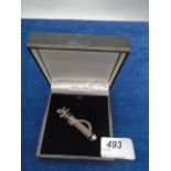 Sterling silver marcasite brooch in shape of golf bag and clubs