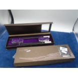2 boxed sets of Hong Kong chopsticks and etched glass rests