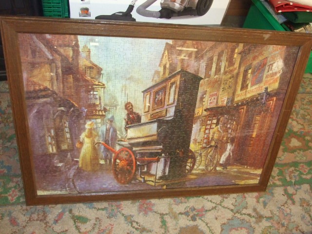 Framed Jigsaw puzzle of Organ Grinder