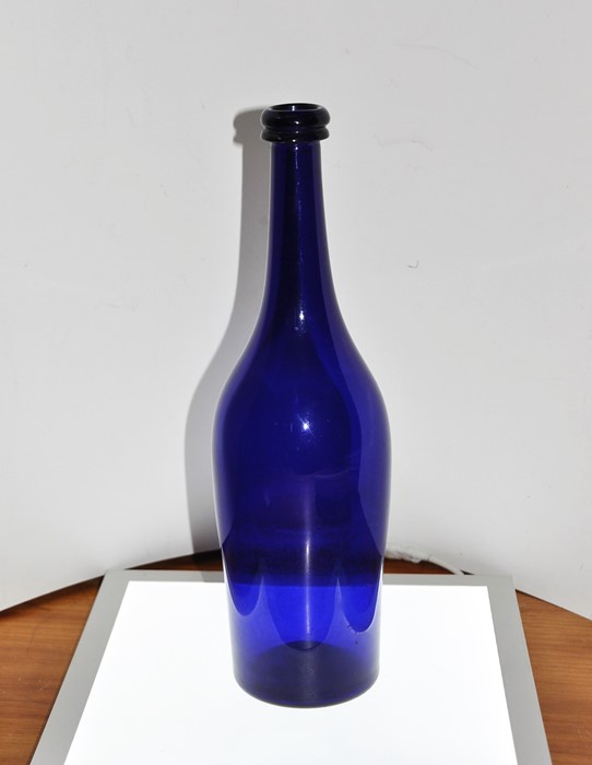 Bristol blue glass bottle approx. 11" tall