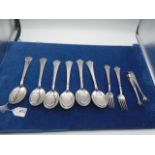 white metal 6 dessert spoons and 2 forks marked 606 and silver sugar tongs, 370g