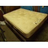 Double divan bed with mattress. Base has 4 drawers