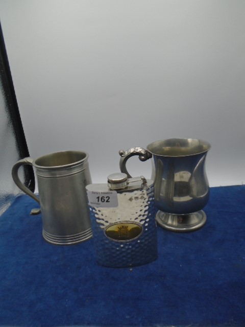 A silver plated tankard, engraved pewter tankard and a Westminster flask