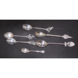 Five assorted silver souvenir teaspoons