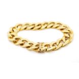 A heavy 18ct yellow gold curb link bracelet