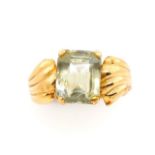 Yellow gold and green gemstone cocktail ring