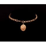 Antique 9ct rose gold half Albert chain and locket