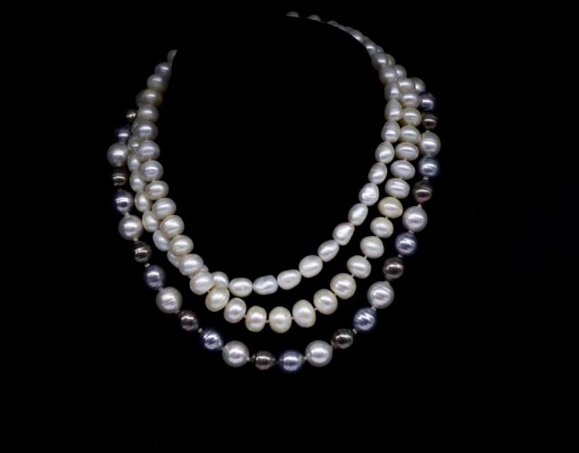 Three single strand cultured pearl necklaces