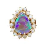 Opal and yellow gold halo ring