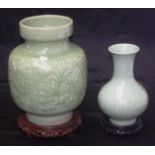 Two eastern celadon vases