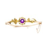 Edwardian 9ct rose gold and amethyst bangle