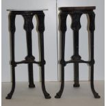 Two cast iron plant stands