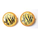 Pair early NSW enamel lapel badges