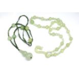 Two Oriental carved jade beaded necklaces