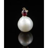 Baroque pearl, garnet and rose gold pendant