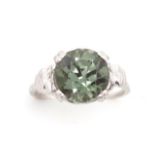 Green gemstone and 9ct white gold cocktail ring