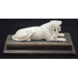 Vintage carved ivory tiger with its prey