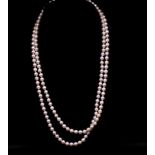A good strand of opera length Akoya pearls,